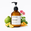 Repair conditioner for damaged hair bottle with natural botanicals, coconut oil, and bergamot extracts.