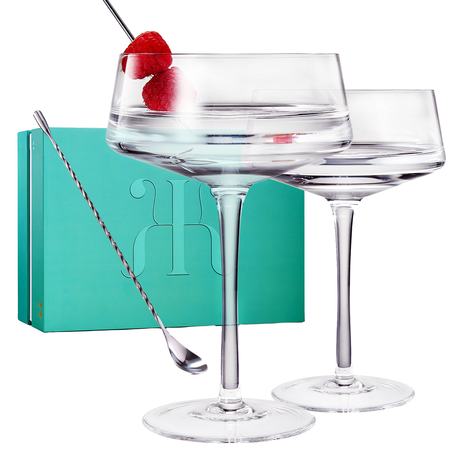 Two luxury clear glass 10oz martini coupes with an elegant silver mixing spoon for home bars