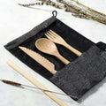 Bamboo travel cutlery set with dark grey jute pouch fork knife spoon and straw