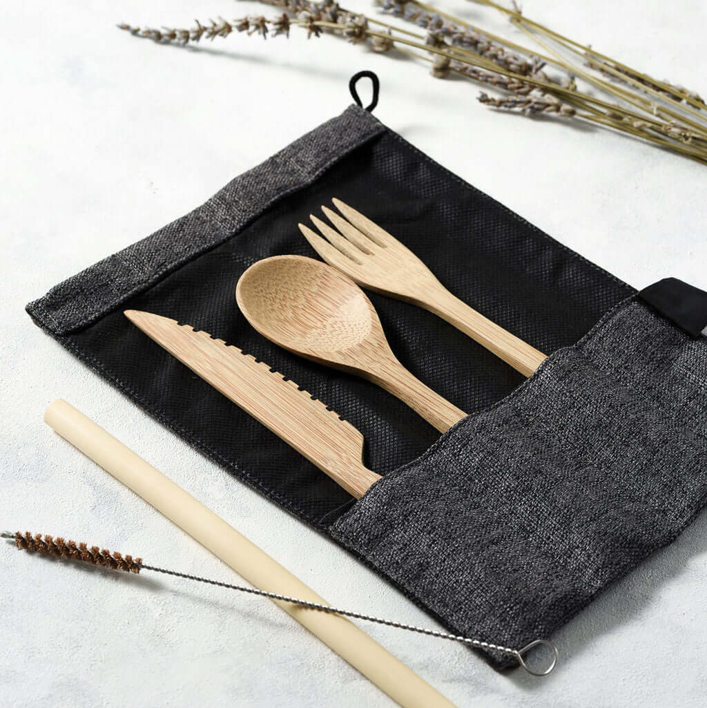 Bamboo travel cutlery set with dark grey jute pouch fork knife spoon and straw