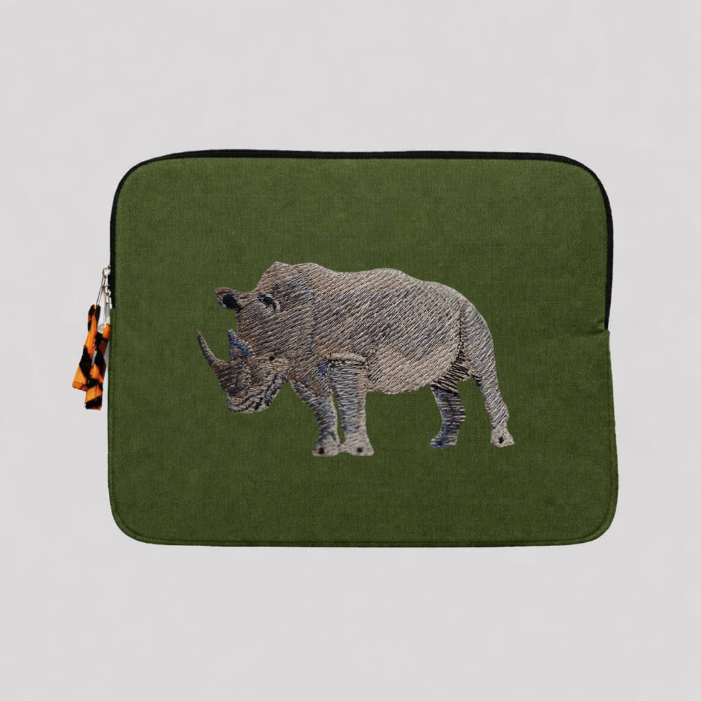 Rhino laptop sleeve made of Kenyan cotton canvas with animal embroidery in warm earthy colors