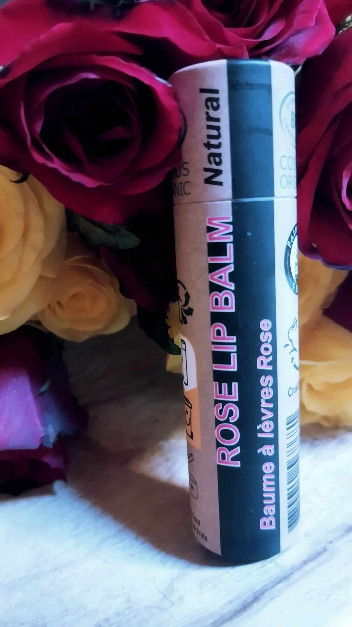 Organic rose lip balm in eco-friendly push-up paper tube packaging with natural ingredients. — view 4