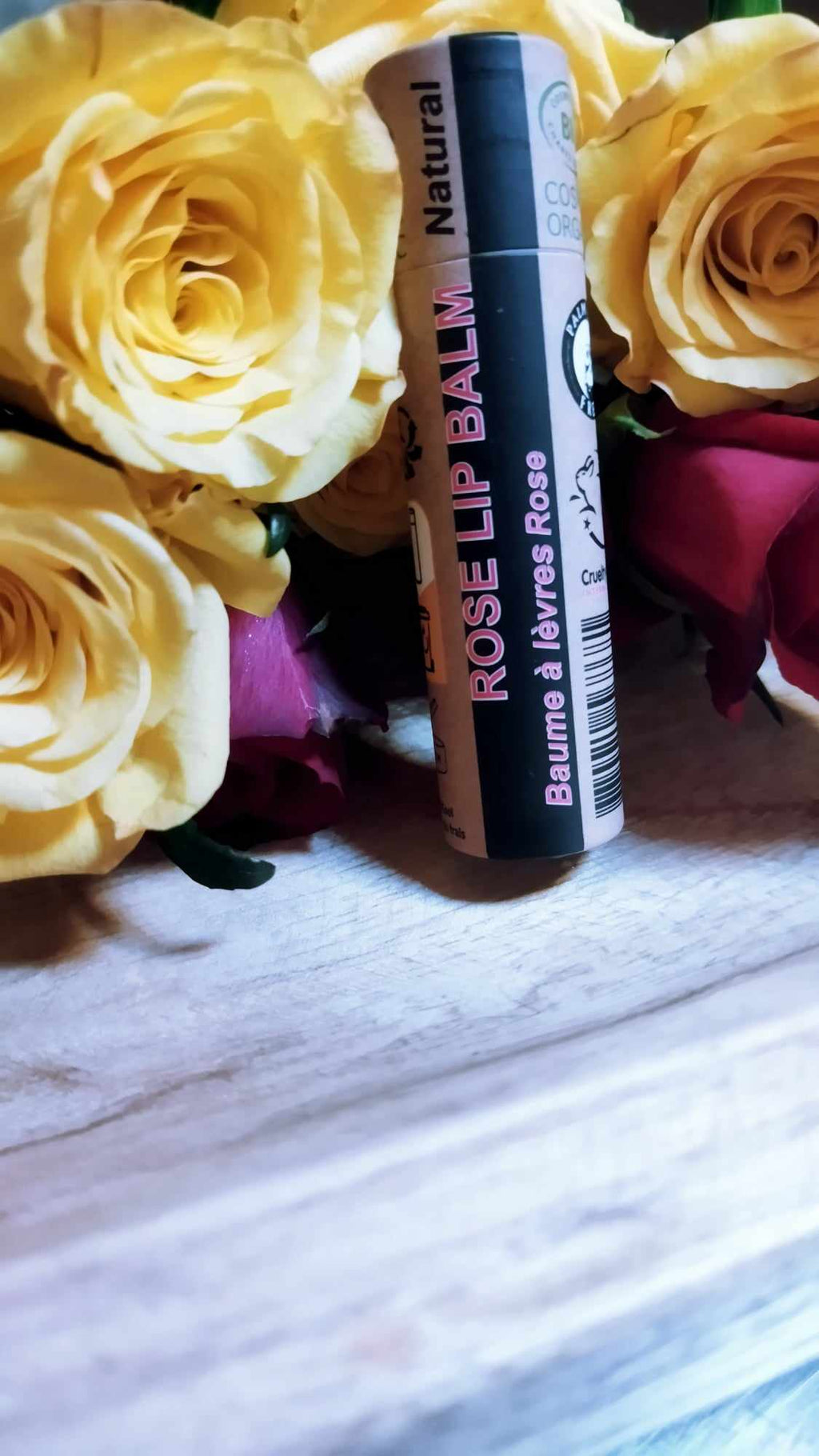 Organic rose lip balm in eco-friendly push-up paper tube packaging with natural ingredients. — view 5