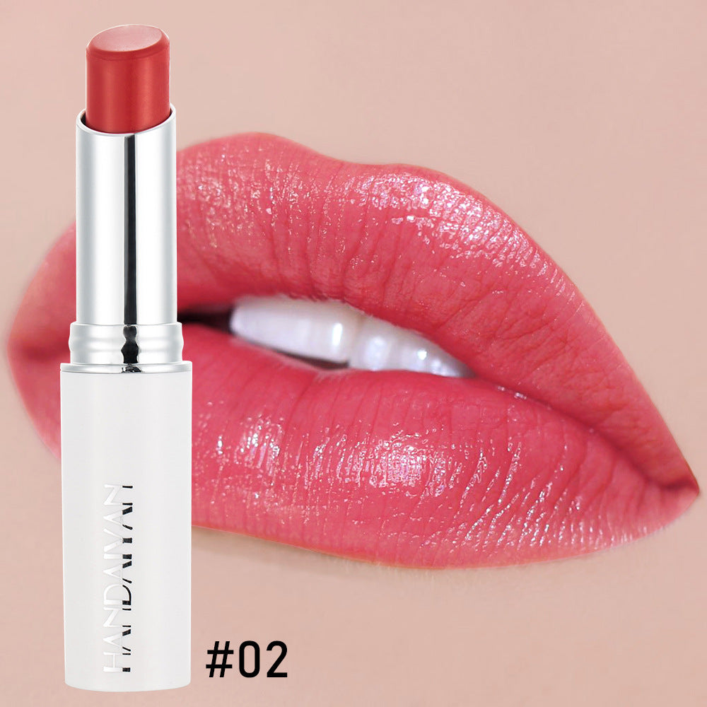 Rosy lipstick collection tube showing vibrant charming red lip color enriched with rose essential oil — view 4