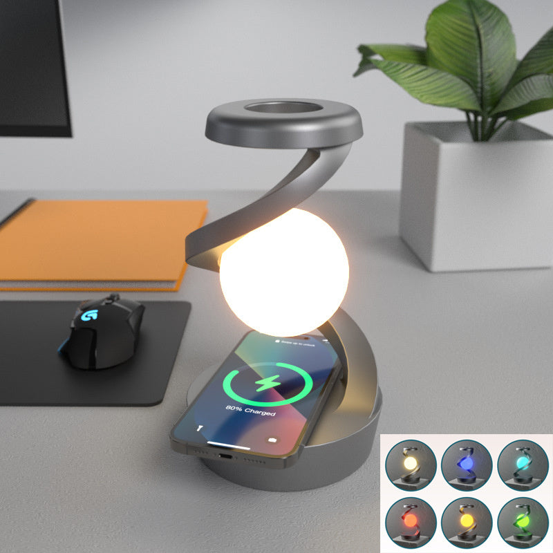 Rotating moon desk lamp with wireless charging base and modern white floating night light shade