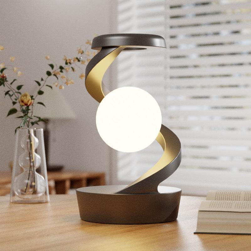 Rotating moon desk lamp with wireless charging base and modern white floating night light shade — view 4