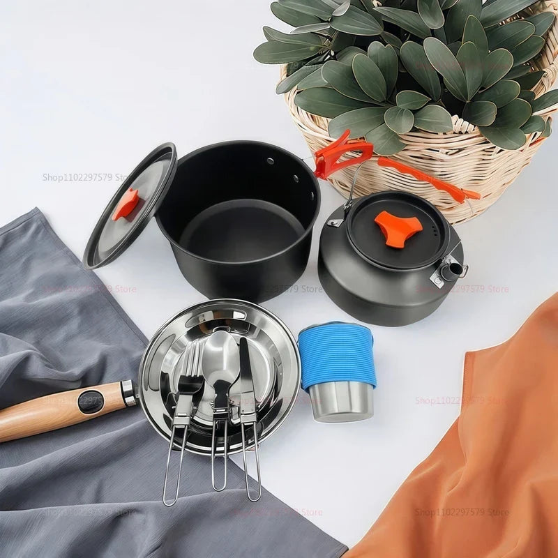 Grey aluminum camping cookware set featuring a pot, kettle, and foldable heat-resistant handles. — view 4
