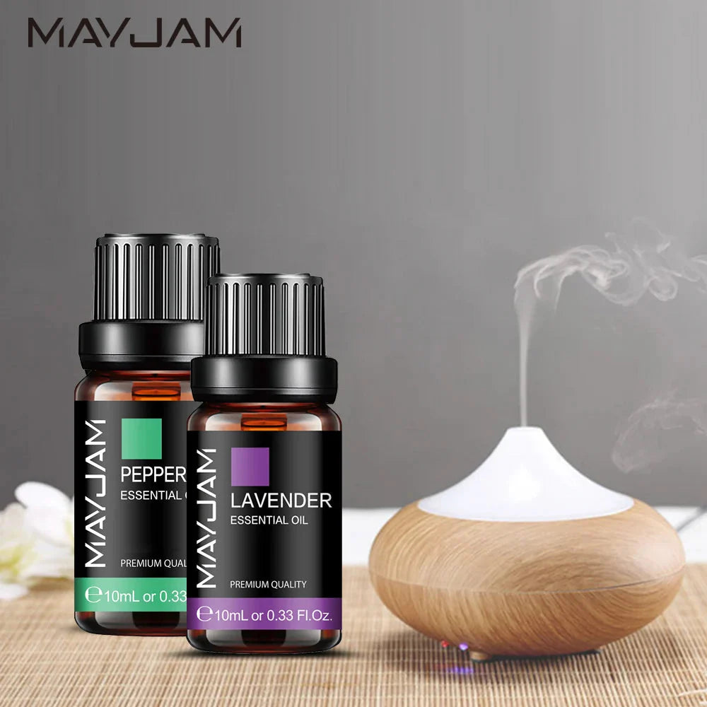 Pure aromatherapy essential oil in a 10ml amber glass bottle for diffusers and candle making — view 2