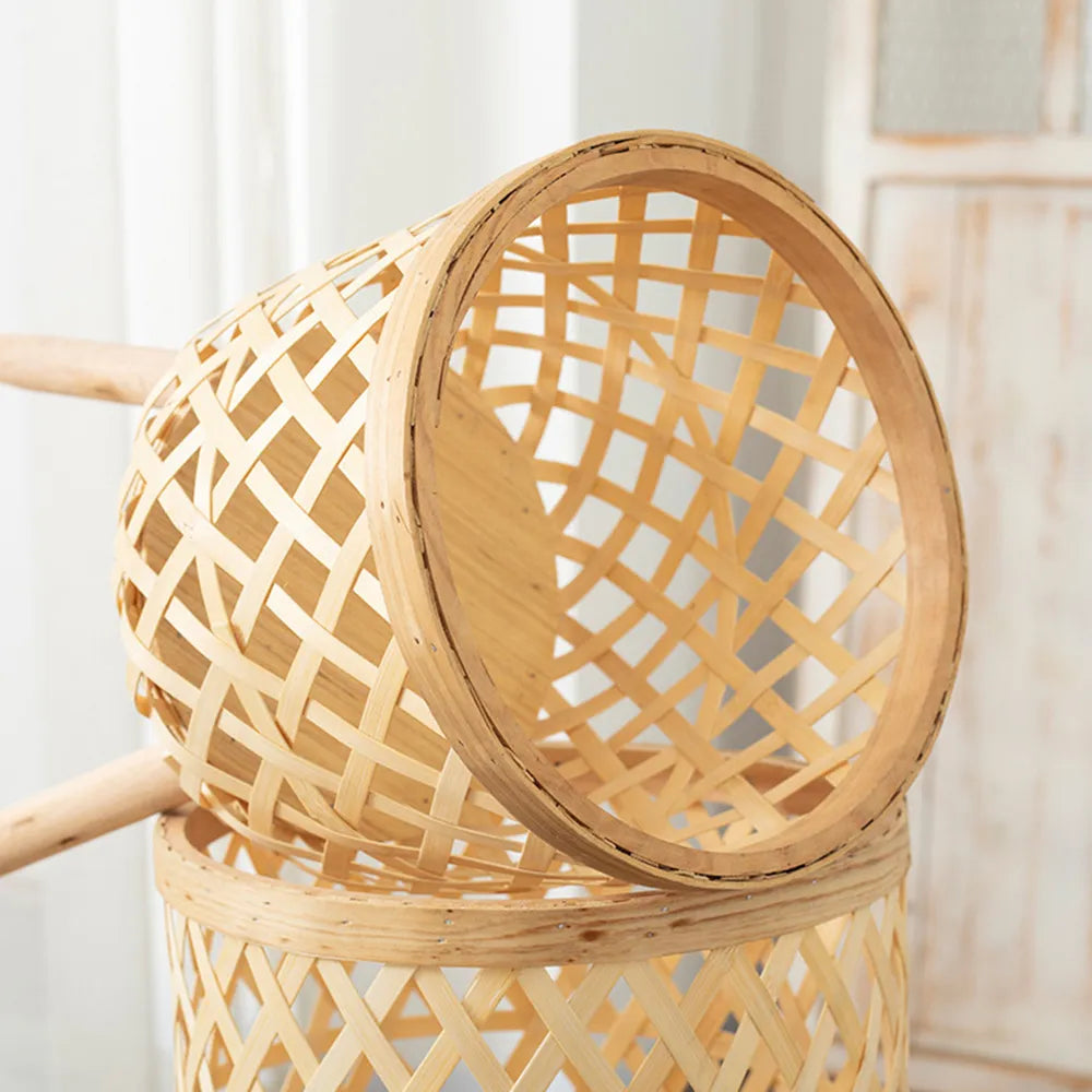 Handmade bamboo woven plant stand with elevated wooden base, displaying a potted green houseplant. — view 5
