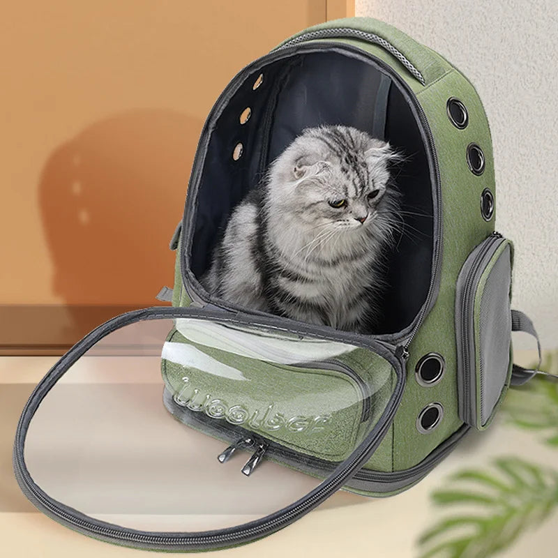 Transparent pet carrier backpack for cats and small dogs made of waterproof green Oxford cloth. — view 4