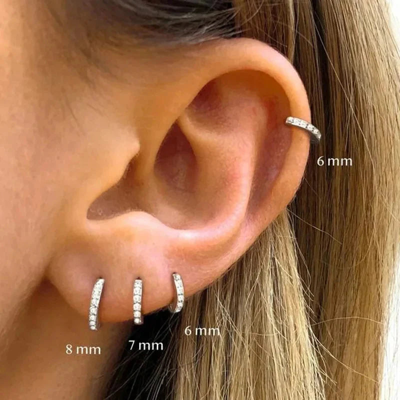 Minimalist stainless steel huggie hoop earrings with sparkling crystal zirconia stones for cartilage piercings — view 4