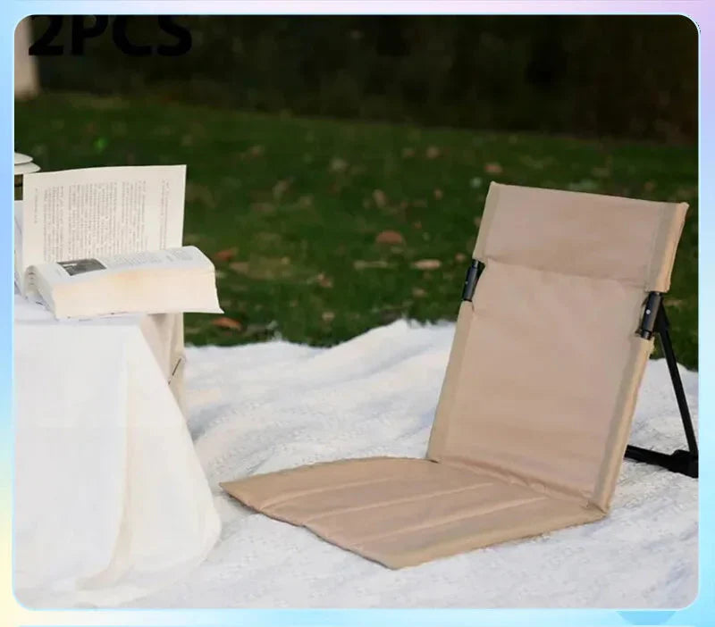 Beige foldable camping chair with padded cushion and compact storage bag for outdoor adventures — view 3