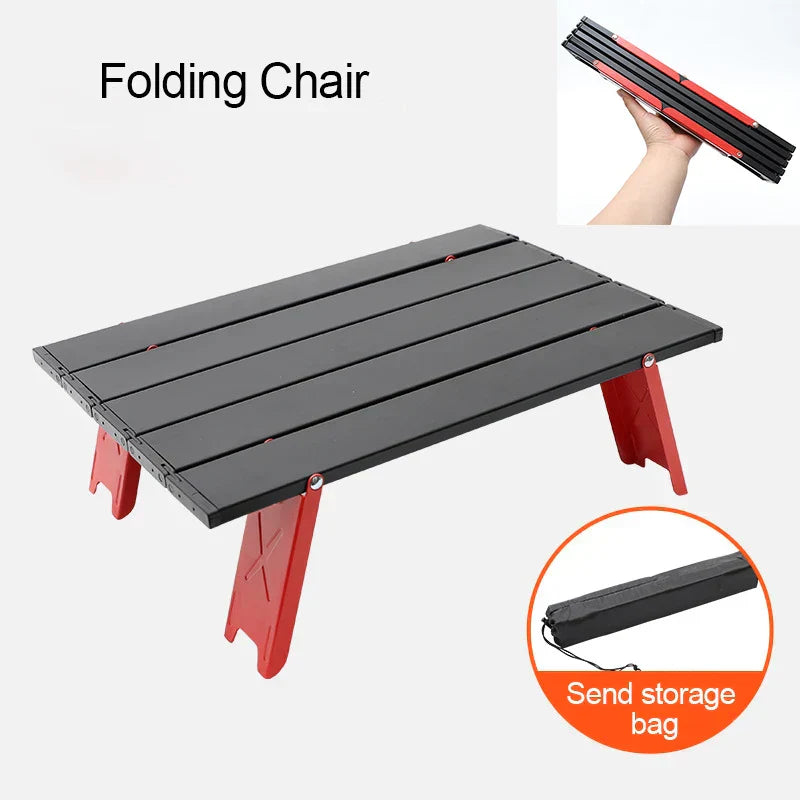 Portable foldable camping table with carry bag set up for an outdoor picnic or barbecue — view 2