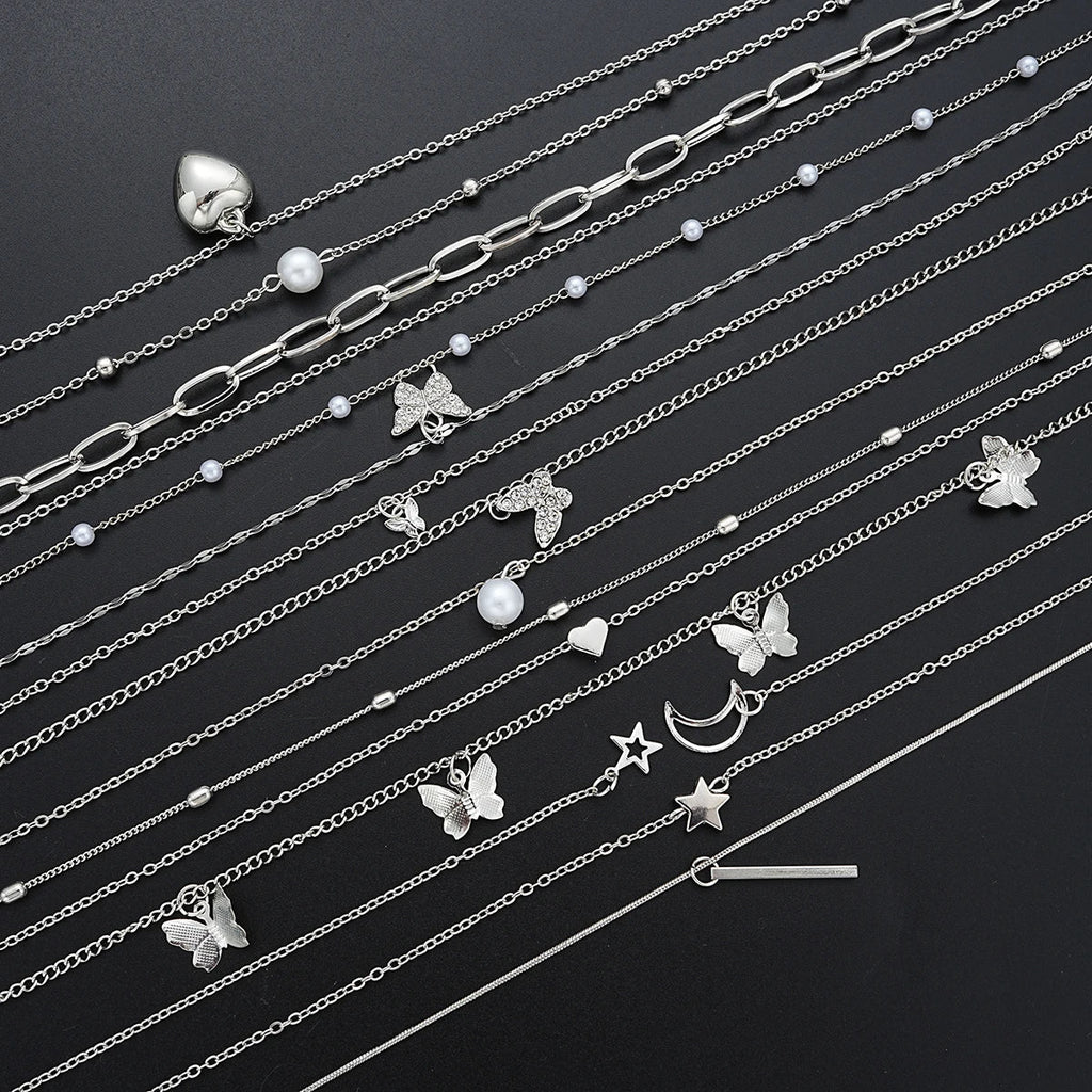 13-piece women's silver tone necklace set featuring heart, star, butterfly, and pearl charm pendants — view 5