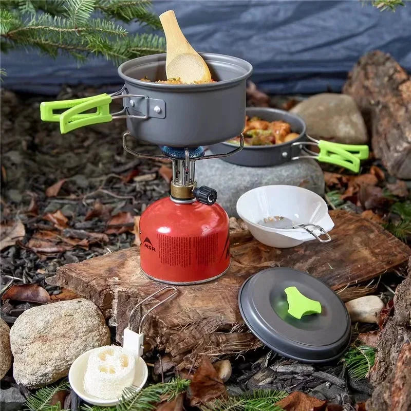 Camping cookware set in anodized aluminum featuring nested pot frying pan and kettle — view 4