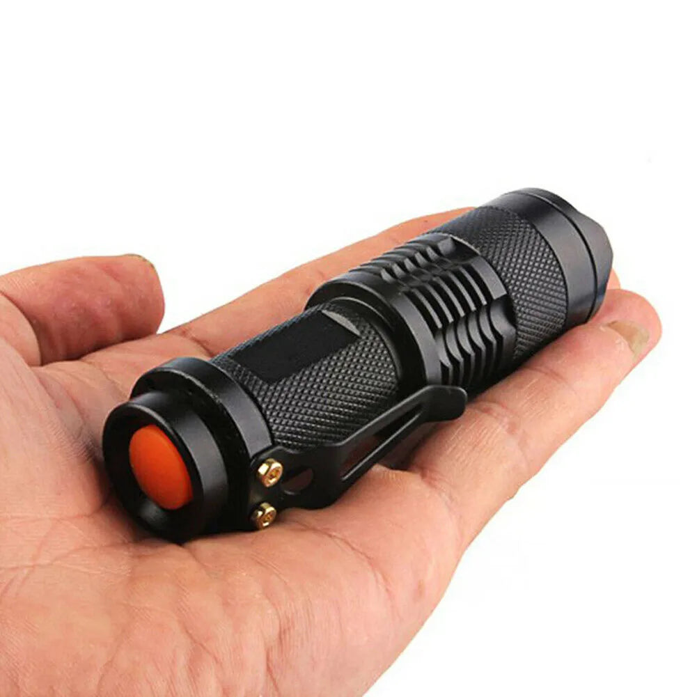 Black waterproof tactical LED flashlight with non-slip texture and tactical tail switch — view 3