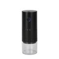 Portable black electric coffee grinder with ceramic burrs and USB-C charging cable