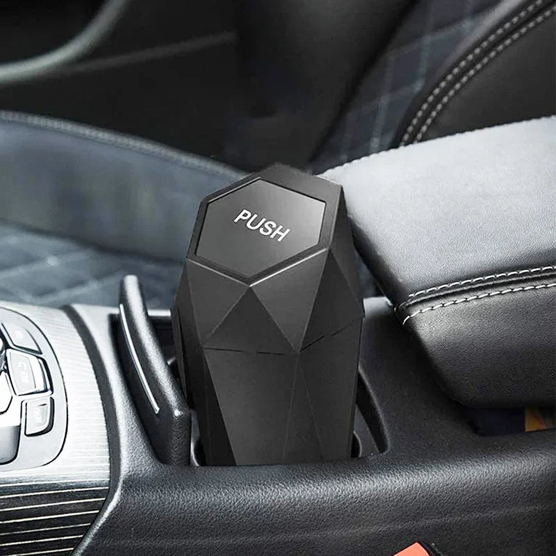 Portable mini car trash can in black with secure lid inside vehicle cup holder — view 5