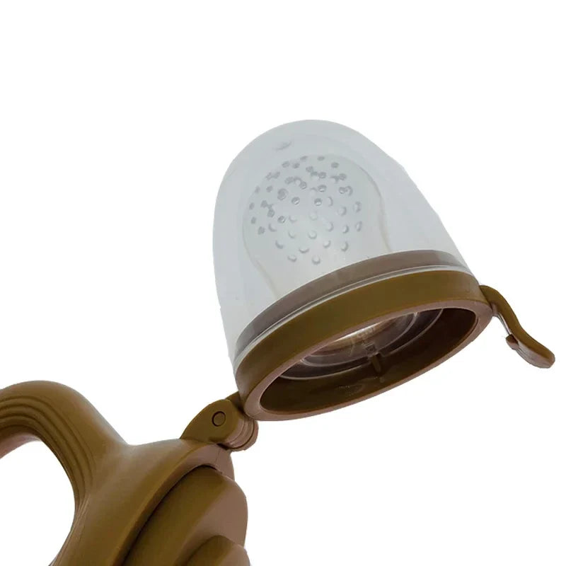 Silicone baby teething pacifier and fruit feeder with easy grip handle for weaning infants — view 4