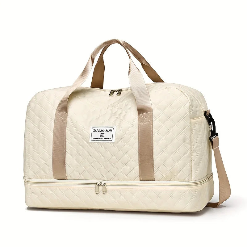 Large beige nylon travel duffel bag with handles and zipper closures for weekend trips