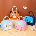 Thermal lunch box for kids in vibrant polyester with raised 3D character details and handle.
