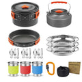 Grey aluminum camping cookware set featuring a pot, kettle, and foldable heat-resistant handles.