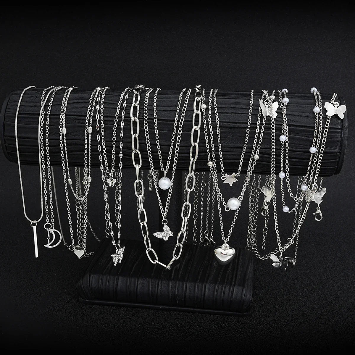 13-piece women's silver tone necklace set featuring heart, star, butterfly, and pearl charm pendants — view 3