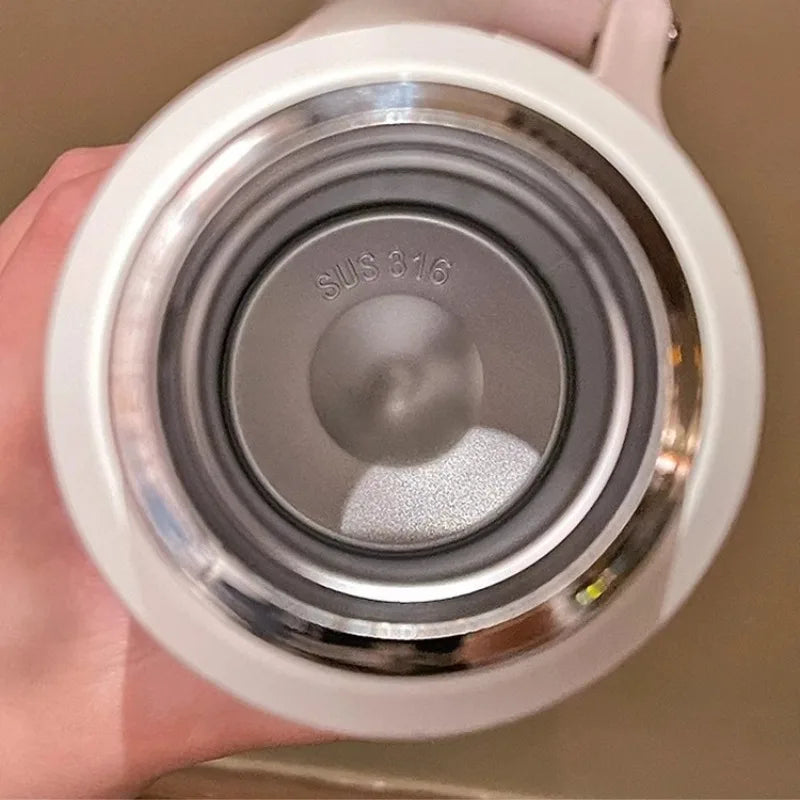 Stainless steel vacuum insulated flask with built-in tea strainer for hot and cold beverages — view 5