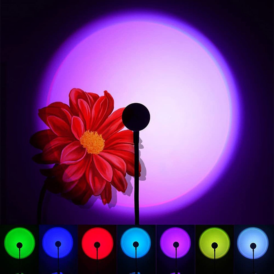NNEOBA USB sunset lamp projector casting a vibrant rainbow neon glow on a bedroom wall — view 2