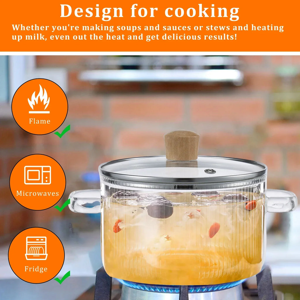 Clear 1.6L borosilicate glass saucepan with matching lid and dual side handles on a stovetop. — view 3