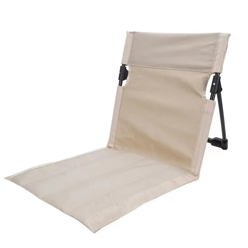 Beige foldable camping chair with padded cushion and compact storage bag for outdoor adventures