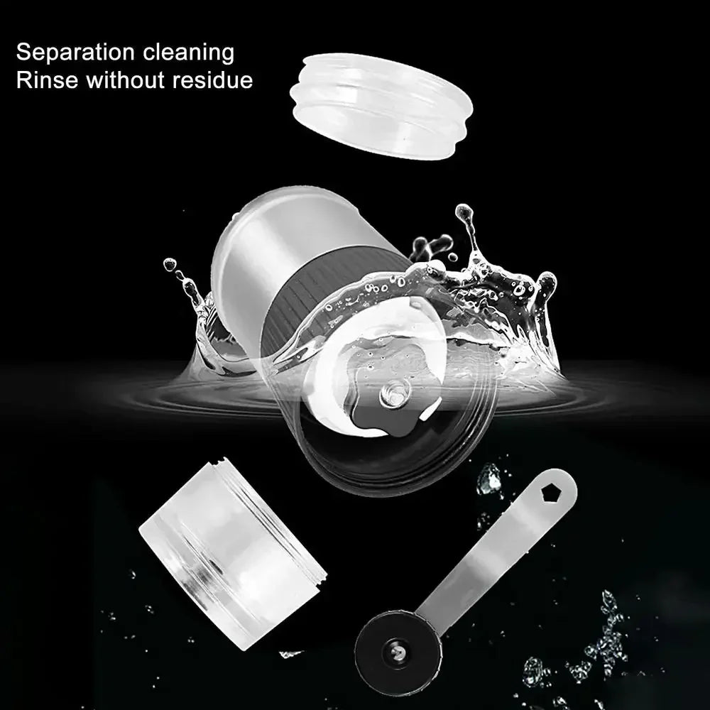 Black manual coffee grinder with hand crank, adjustable ceramic burr, and silicone base — view 5