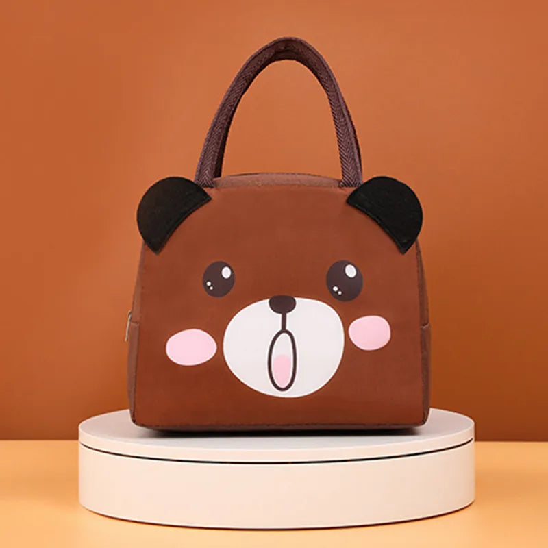 Thermal lunch box for kids in vibrant polyester with raised 3D character details and handle. — view 5
