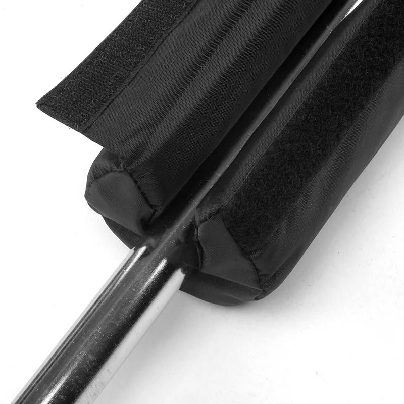 Black OBA fitness barbell pad with oxford cloth cover on a standard Olympic weightlifting bar — view 3
