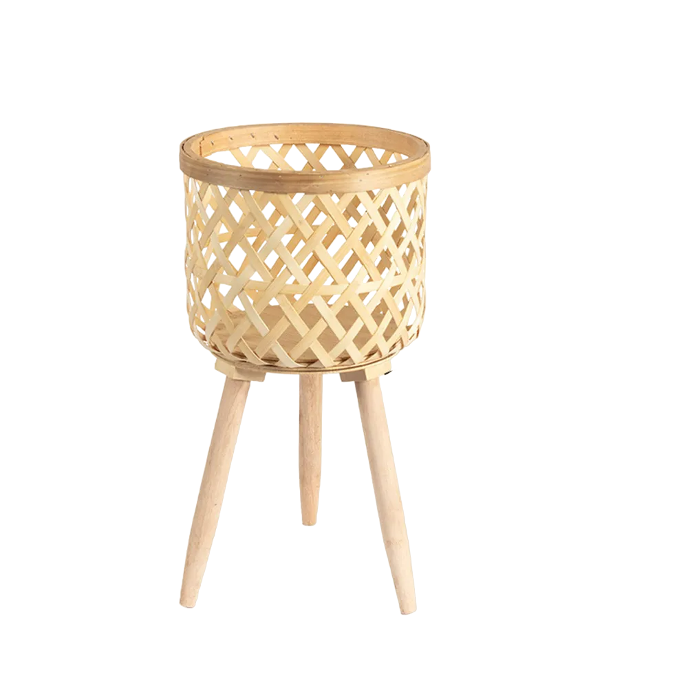 Handmade bamboo woven plant stand with elevated wooden base, displaying a potted green houseplant.