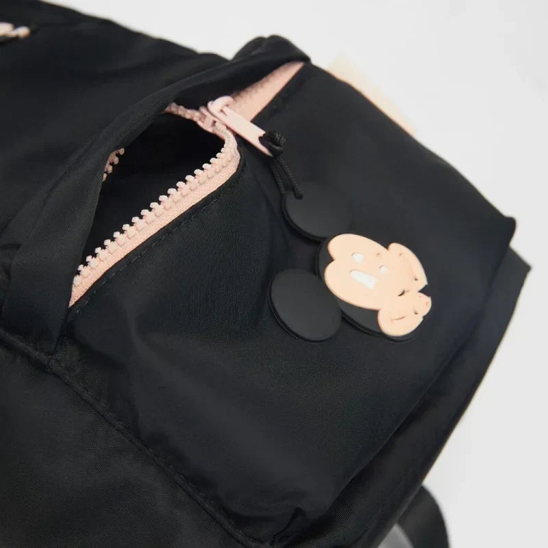 Luxury kids school backpack featuring Mickey Mouse design with raised ears and zippered front pocket — view 4