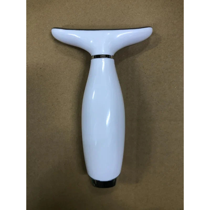 Portable LED light therapy face and neck massager with a sleek white dolphin biomimetic design — view 3
