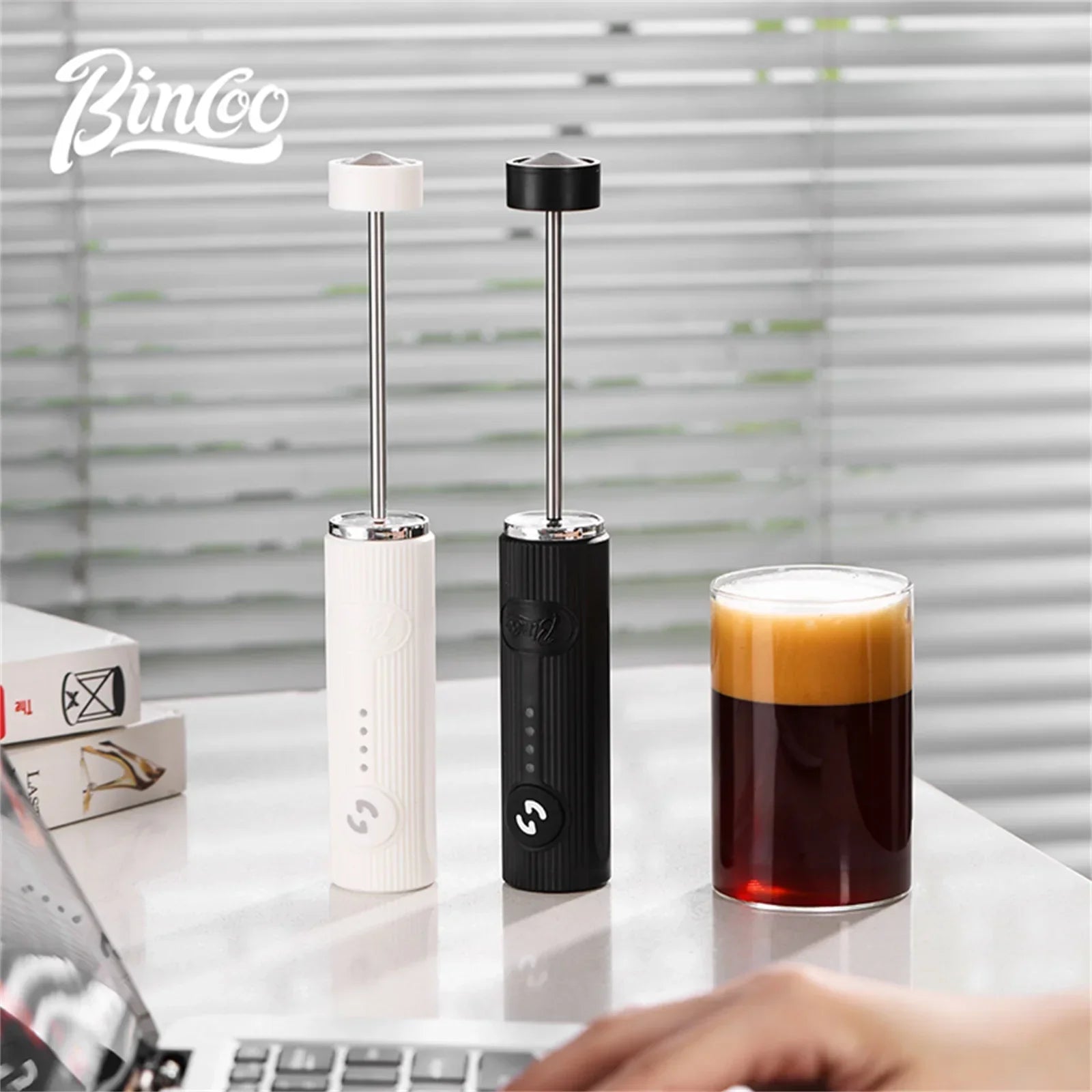 Black wireless electric milk frother with stainless steel whisk head and ergonomic handle — view 2