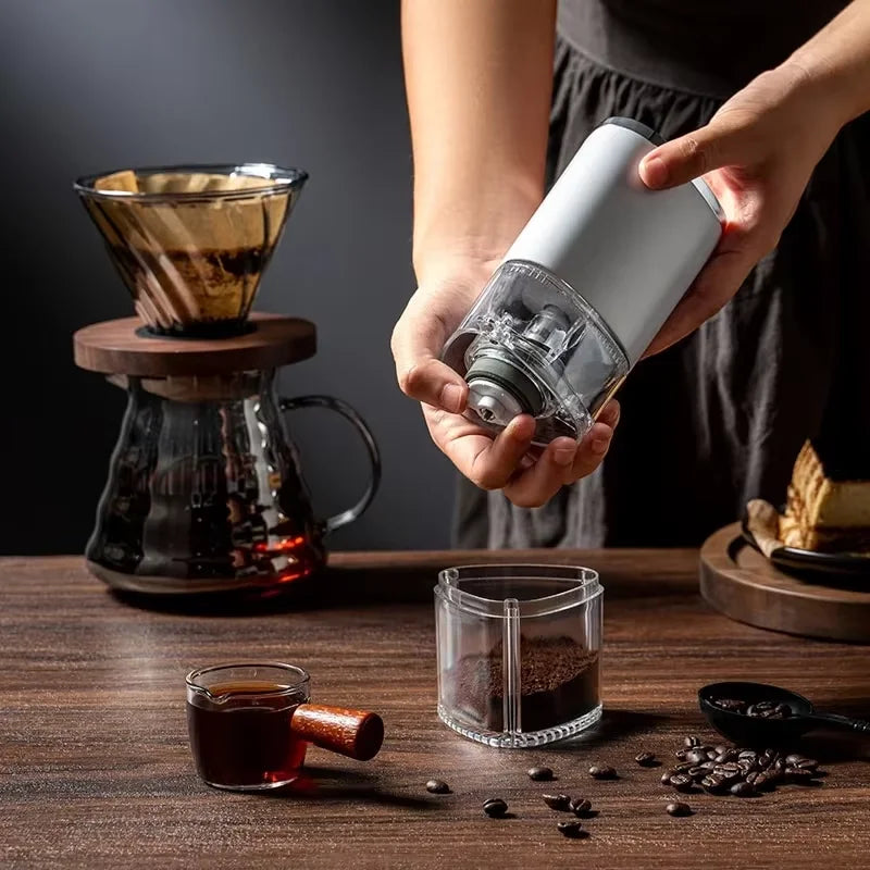 Black portable electric coffee grinder with adjustable settings and USB Type-C charging port — view 2