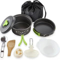 Camping cookware set in anodized aluminum featuring nested pot frying pan and kettle