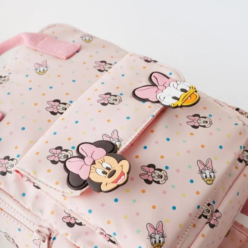 Mini school backpack featuring a Minnie Mouse design, top handle, and adjustable straps — view 5