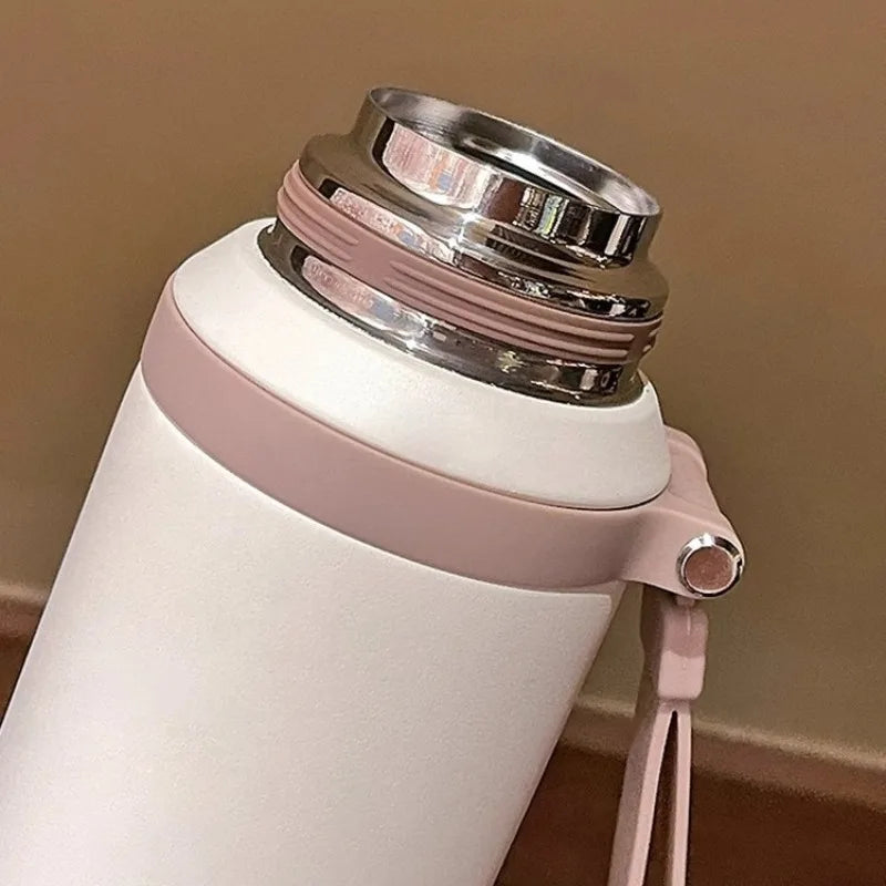 Stainless steel vacuum insulated flask with built-in tea strainer for hot and cold beverages — view 4