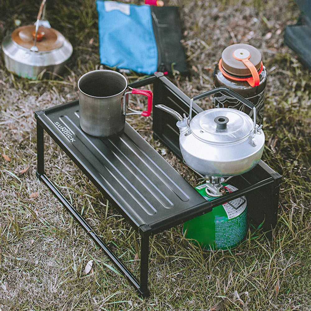Black folding portable camping table made of lightweight aluminum alloy with included carrying storage bag — view 5
