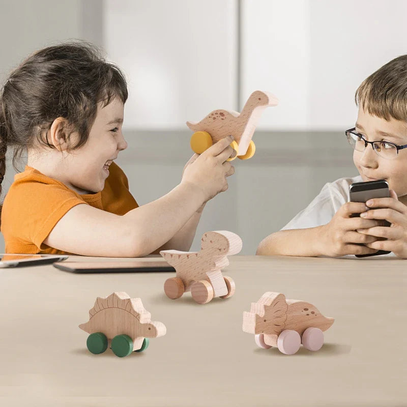 Beech wood Montessori dinosaur toy car with laser engraved details and painted rolling wheels — view 5