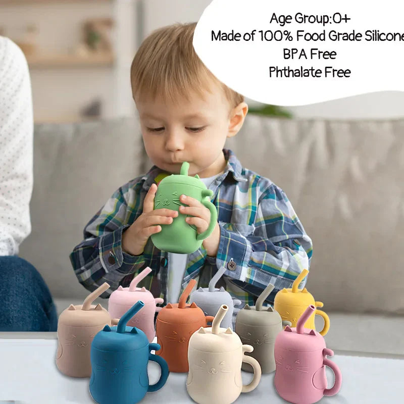 Silicone straw water bottle for kids with embossed cat face and curved tail handle — view 5
