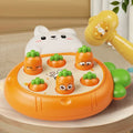 Educational carrot toy game with peeking rabbit, plastic playtime hammers, and bright interactive surface.