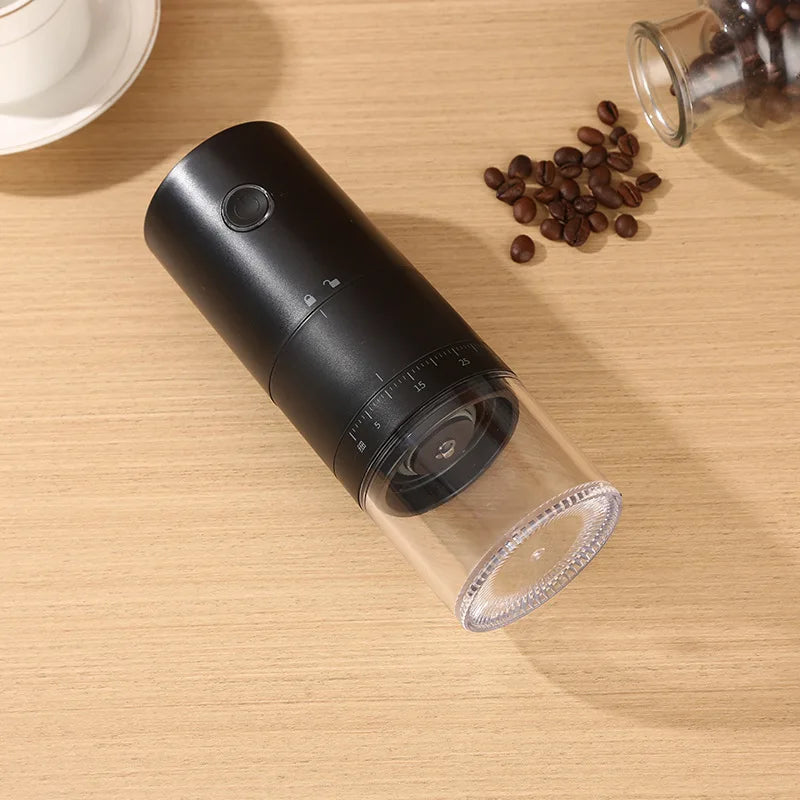 Portable black electric coffee grinder with ceramic burrs and USB-C charging cable — view 4