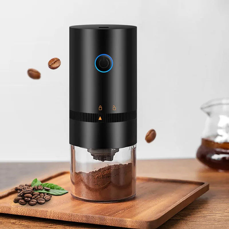 Black portable USB-C rechargeable coffee grinder with ceramic burr mill and clear powder chamber — view 2