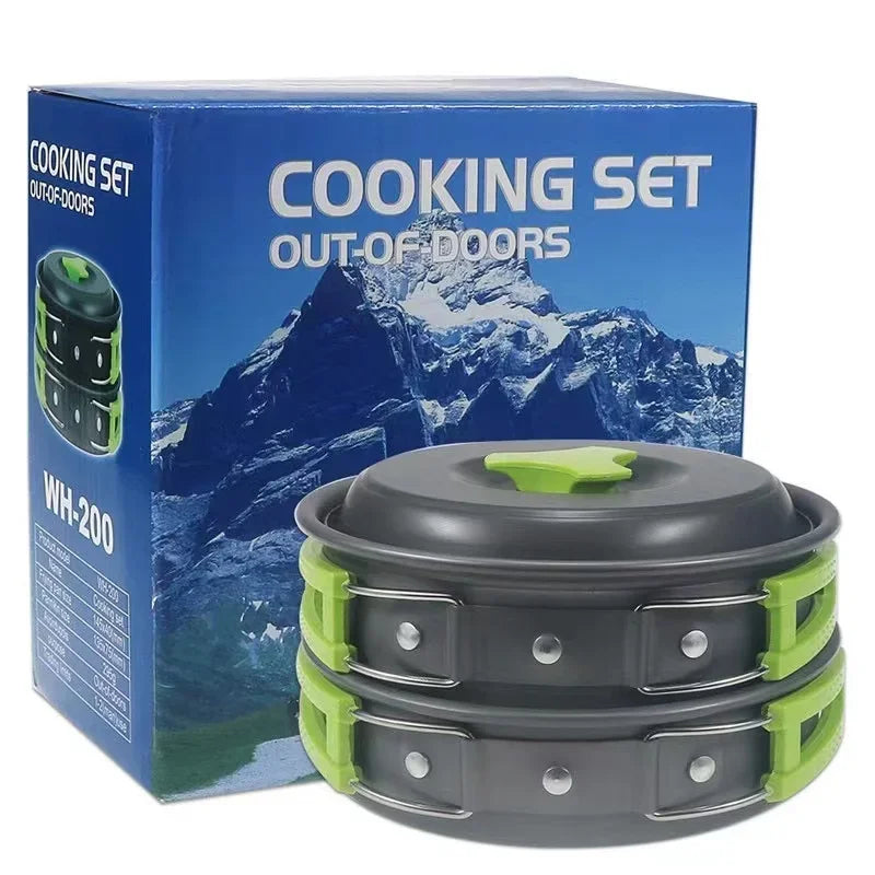 Camping cookware set in anodized aluminum featuring nested pot frying pan and kettle — view 2