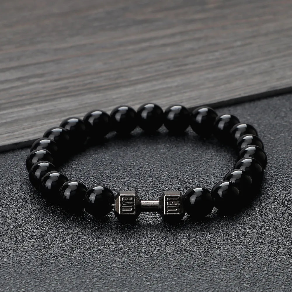 Dumbbell bead bracelet featuring natural black stone beads and silver fitness charm — view 2